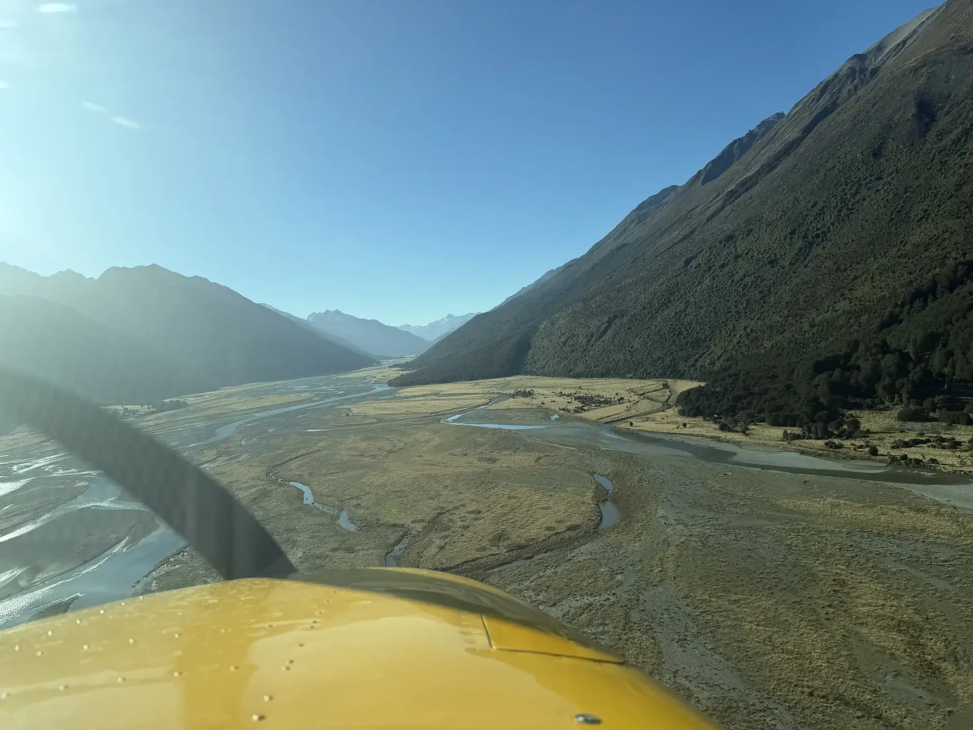 Flying over the lakes and valleys near Wanaka